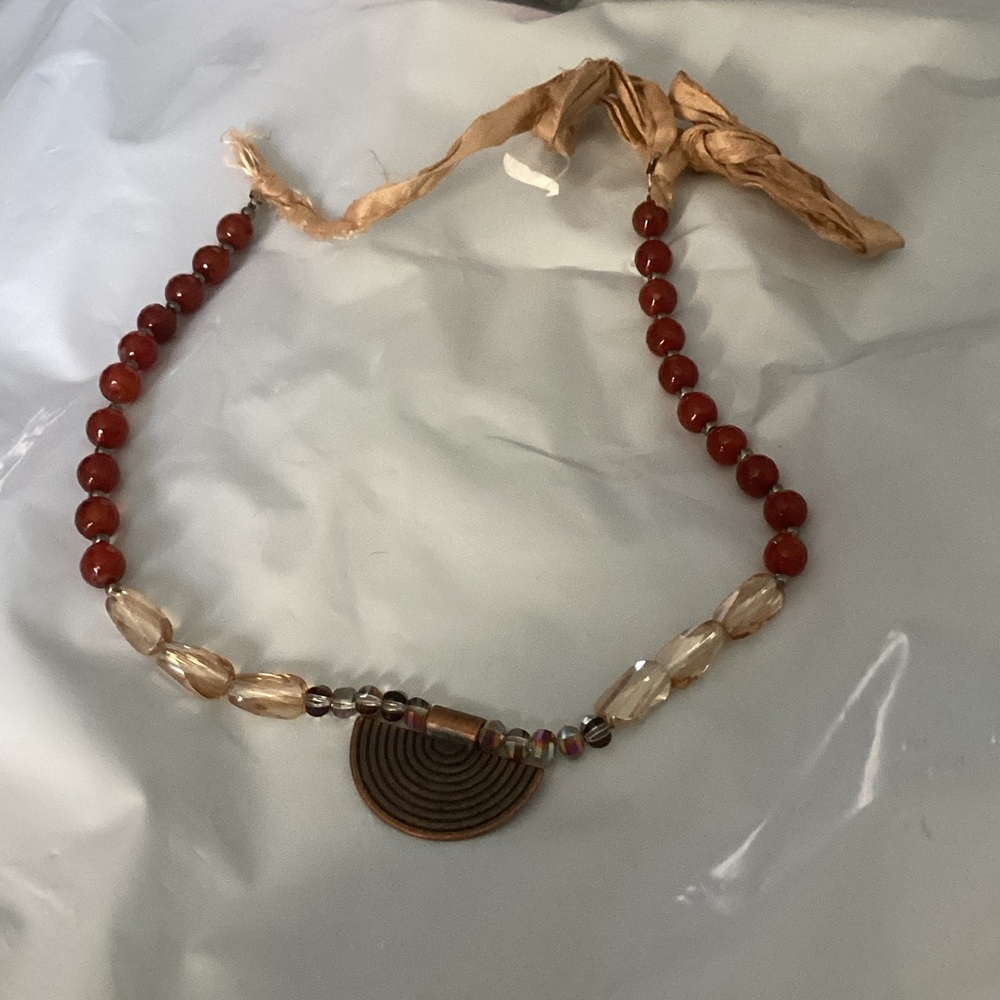 Elegant Beaded Necklace with Red and Gold Hues